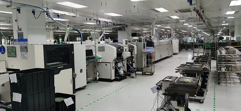 A wide view of a factory floor where PCBs are being manufactured.