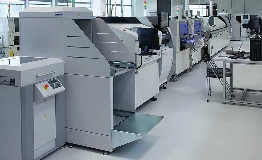 A view of a PCB assembly line with automated machines.