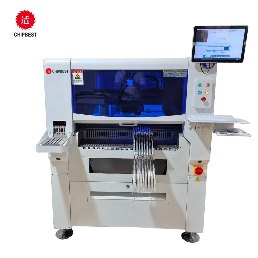 A pick and place machine placing components on a PCB.