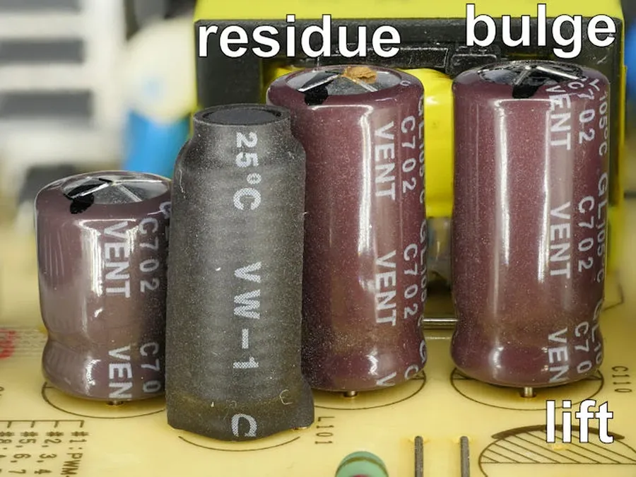 A picture of a bulging and failed electrolytic capacitor.