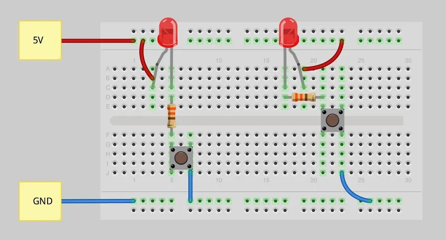 A 2.2k ohm resistor used in a breadboard circuit.