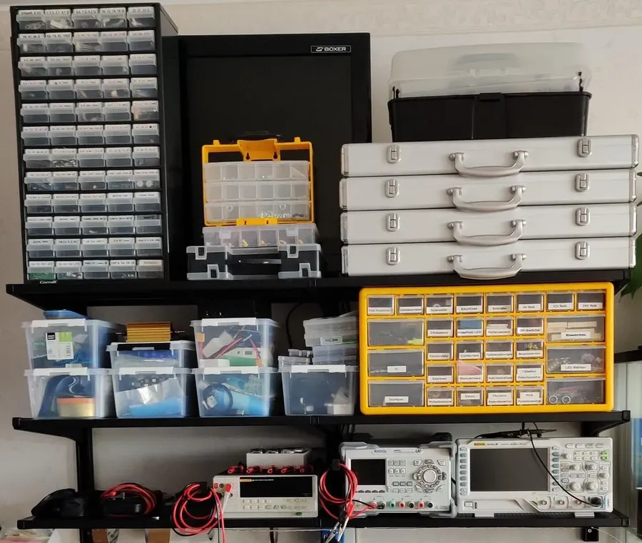 A shelf in an electronics store stocked with various resistors.