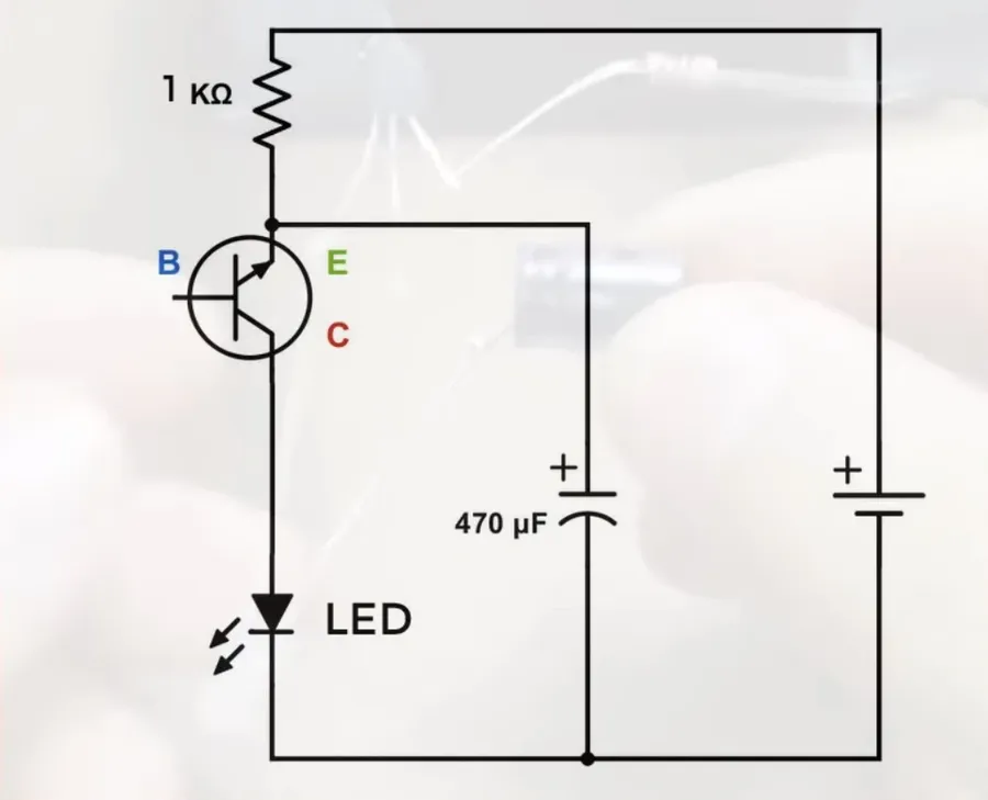 A BC547 transistor mounted on a breadboard with other electronic components.