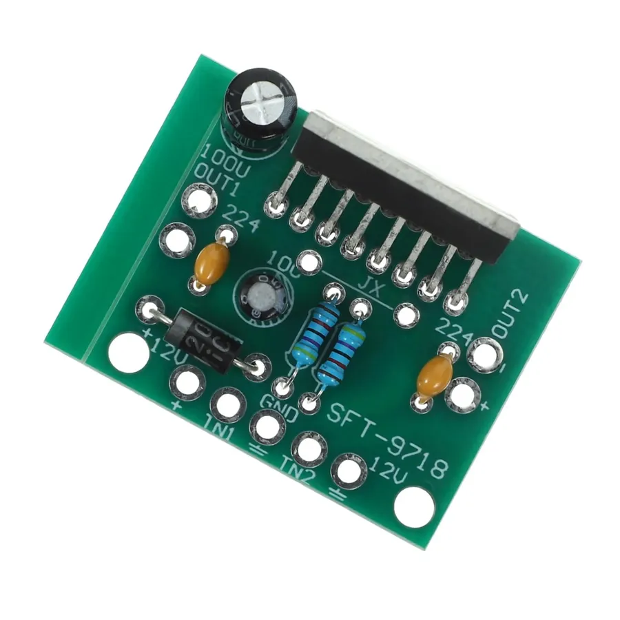 An audio amplifier circuit board showcasing multiple Elna capacitors.