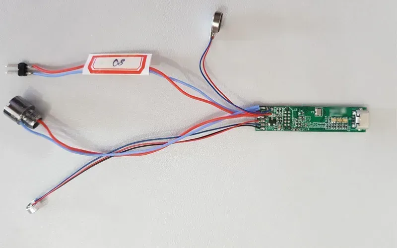 E-cigarette PCB being tested on a functional test fixture