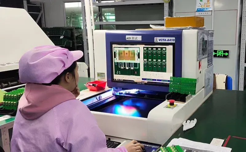 A PCB being tested by equipment