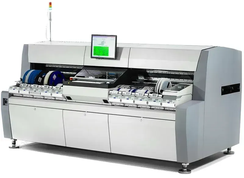 An SMT assembly machine placing components on a PCB
