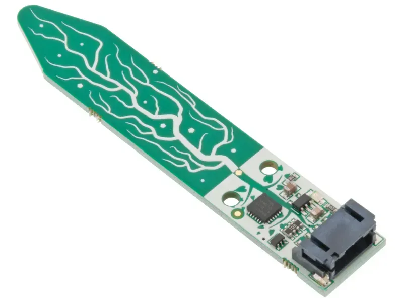A detailed view of soil moisture sensor PCB components.