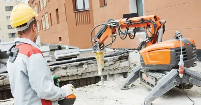 A construction robot performing tasks on a construction site