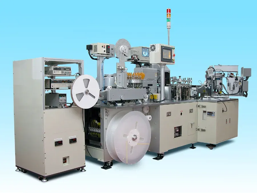 A factory line producing capacitors.