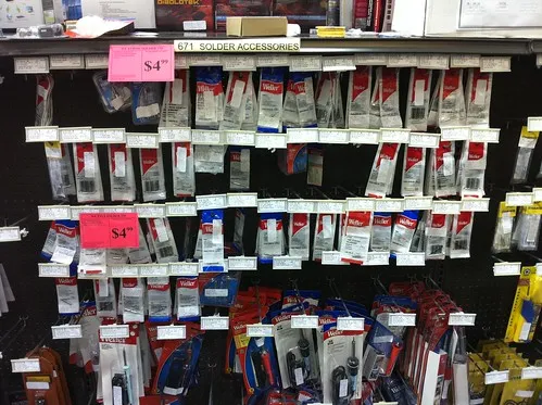 A store shelf with various electronic components.