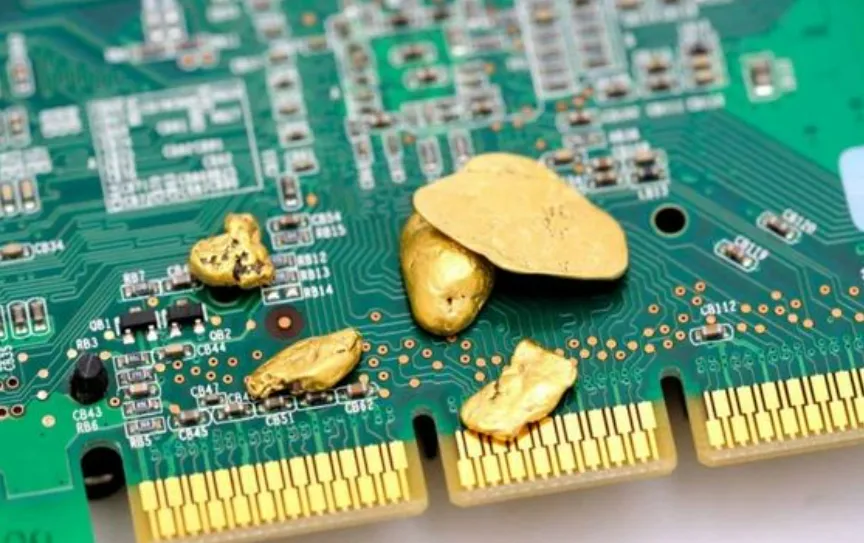 A close-up of a PCB with gold plated surface finish.