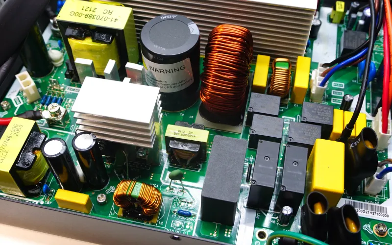 A display of different types of UPS PCBs with varying layouts and component densities.