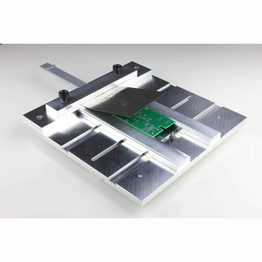 A PCB stencil printer with a solder paste stencil.