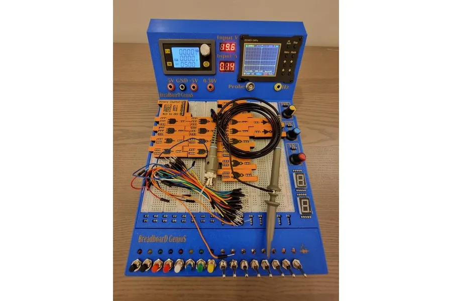 A breadboard being used in an educational setting with components and wires.