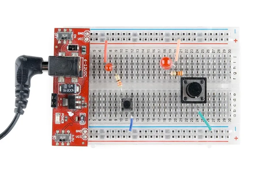 A close-up of components wired on a breadboard.
