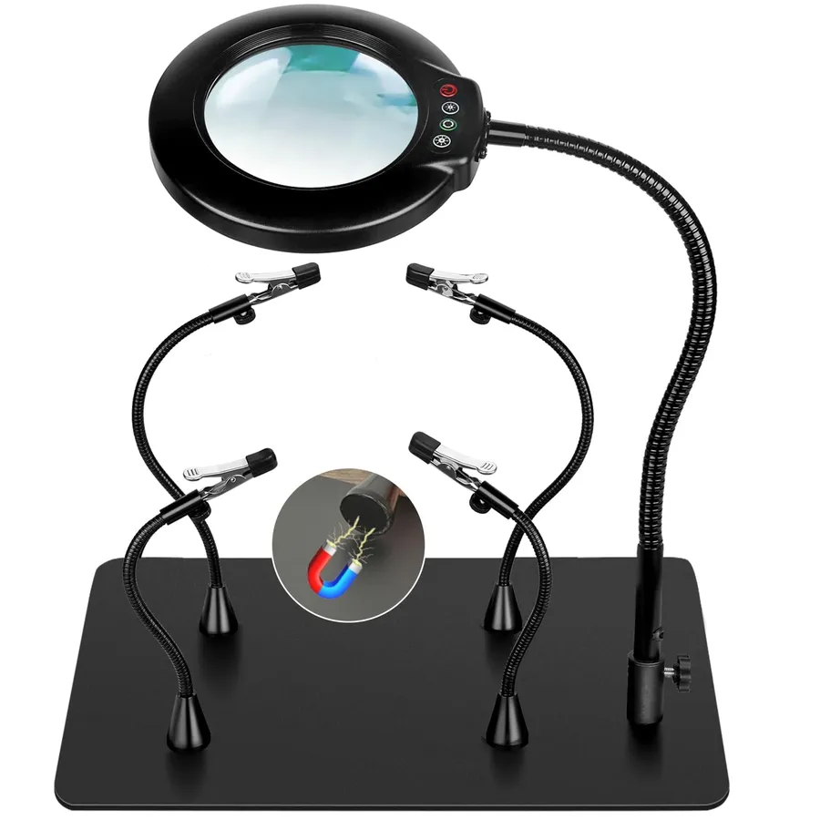 A PCB stand with an attached magnifying glass.