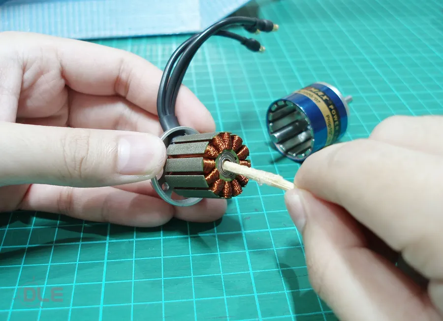 A BLDC fan motor taken apart with the circuit board visible.
