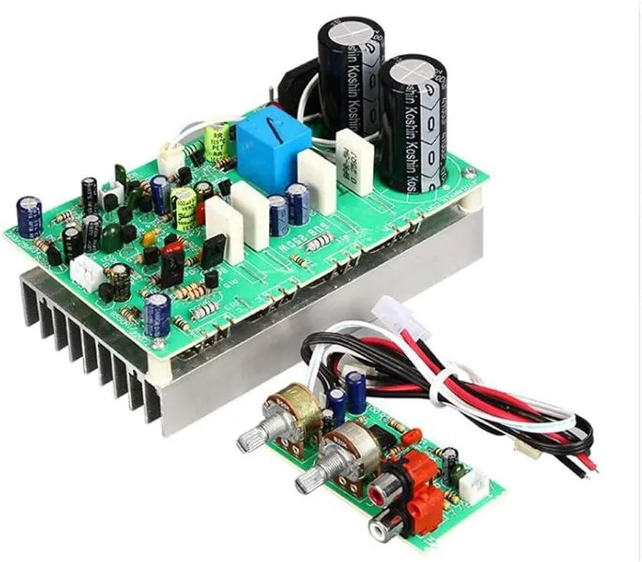 A partially assembled amplifier board being worked on.
