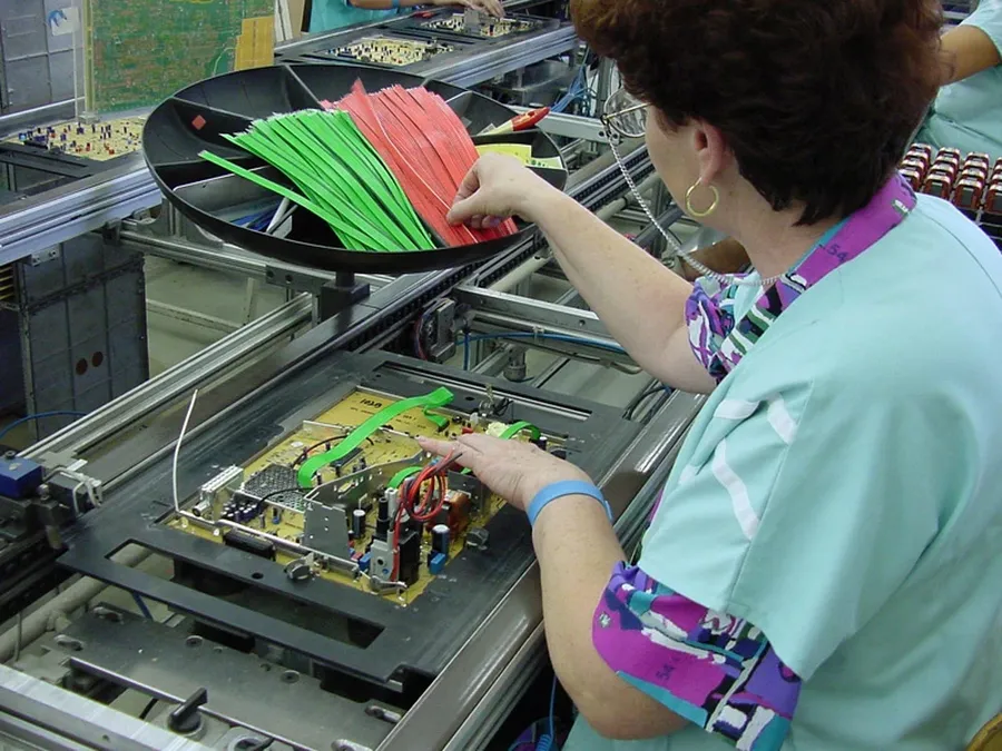 A fully assembled printed circuit board with all components.