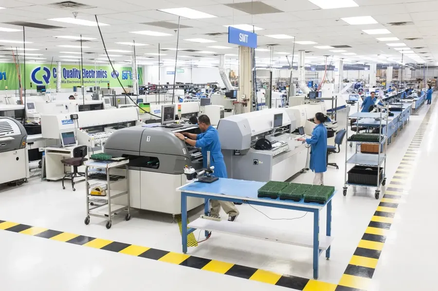 A view of a PCB manufacturing facility with various fabrication equipment.