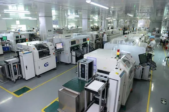 Various machines used in a PCB factory, such as drilling, etching, and plating machines.