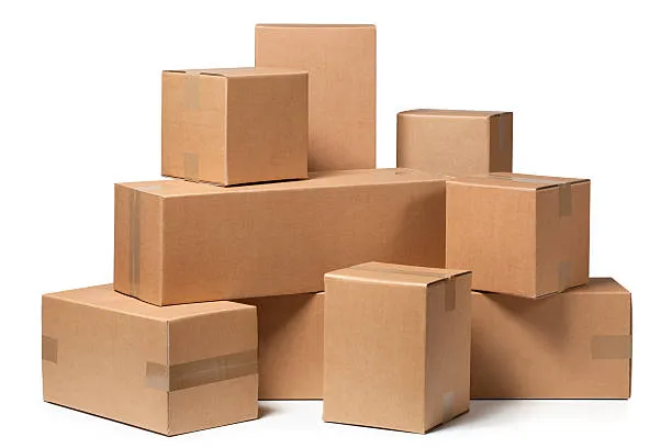 A stack of shipping boxes labeled for delivery.