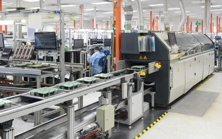 A photo of a busy PCB assembly workshop.