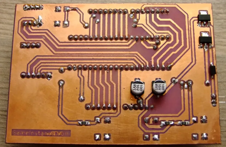 An image of a homemade PCB, showcasing the DIY process.