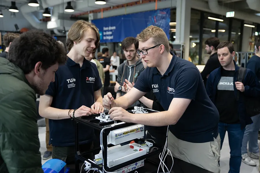 A team working together on PCB projects.