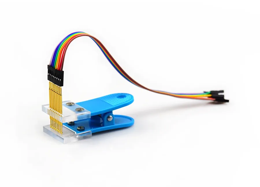 A PCB probe contacting test points on a circuit board.