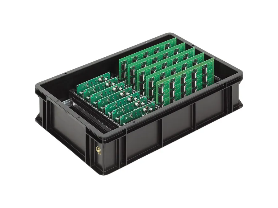 A PCB being prepared for shipment in protective packaging.