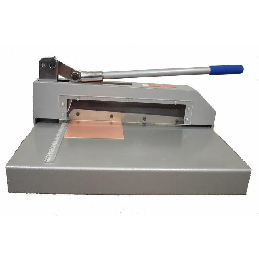 A machine cutting a PCB sheet.