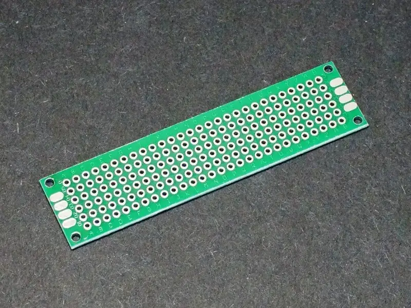 A set of bare PCB prototypes showing different designs.