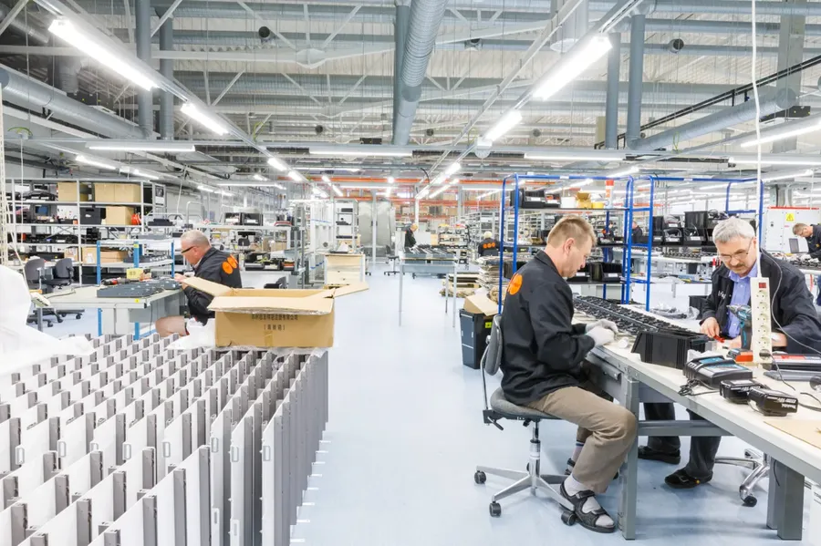 A view of a PCB factory floor with production equipment.