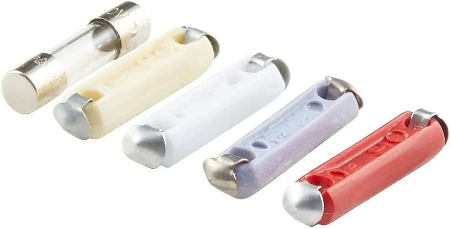 A ceramic fuse with marked specifications.