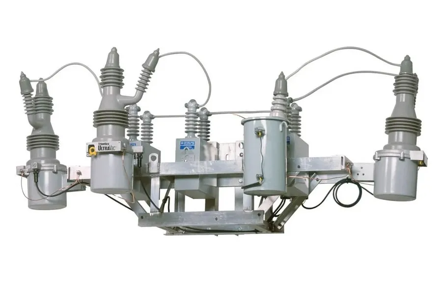 A capacitor bank, showing multiple large capacitors connected together.