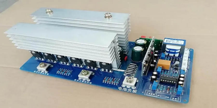 A circuit board for a 600 watt inverter with various electronic components.