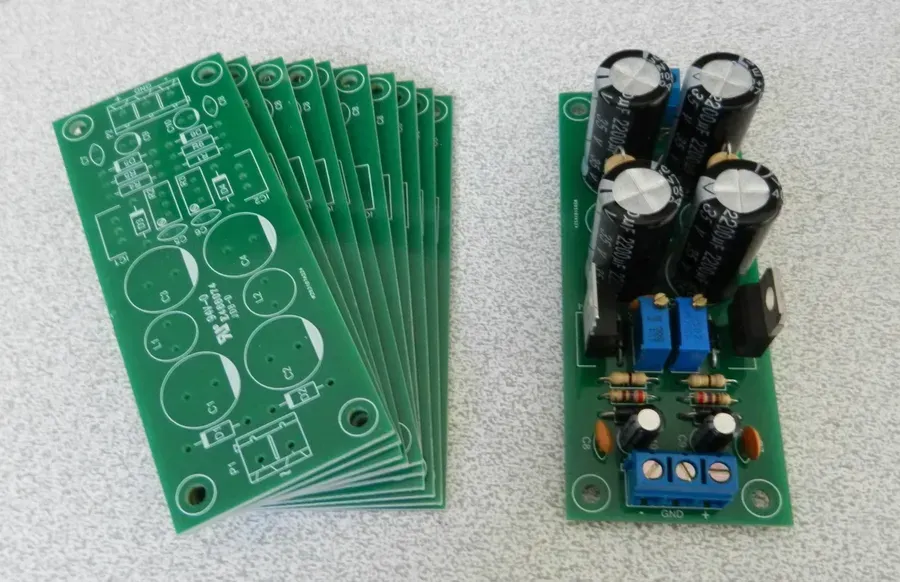 A circuit board inside a power adapter showing a rectifier diode.