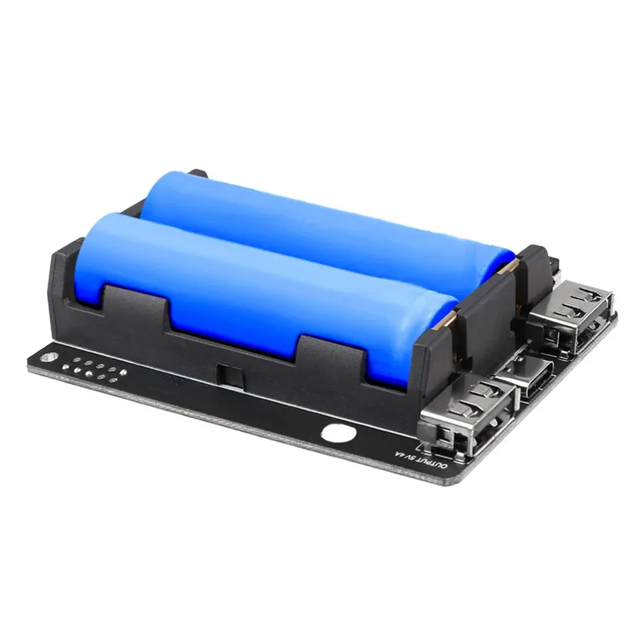 A close-up of different types of batteries used as power sources for electronic circuits.