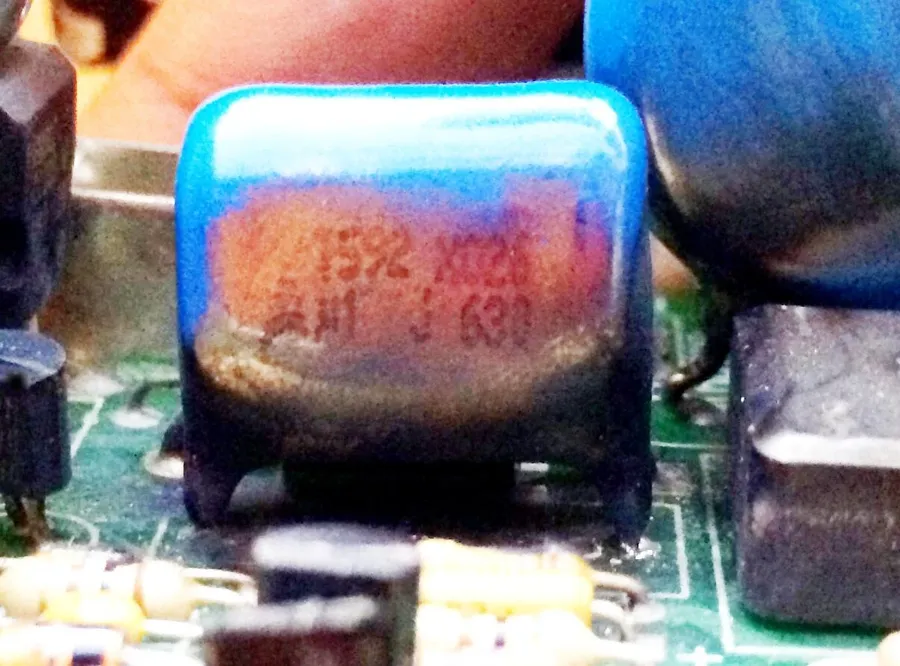 A damaged or bulging capacitor.