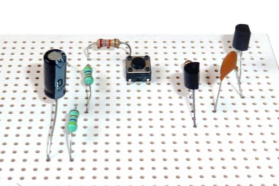 A complex circuit built on stripboard.