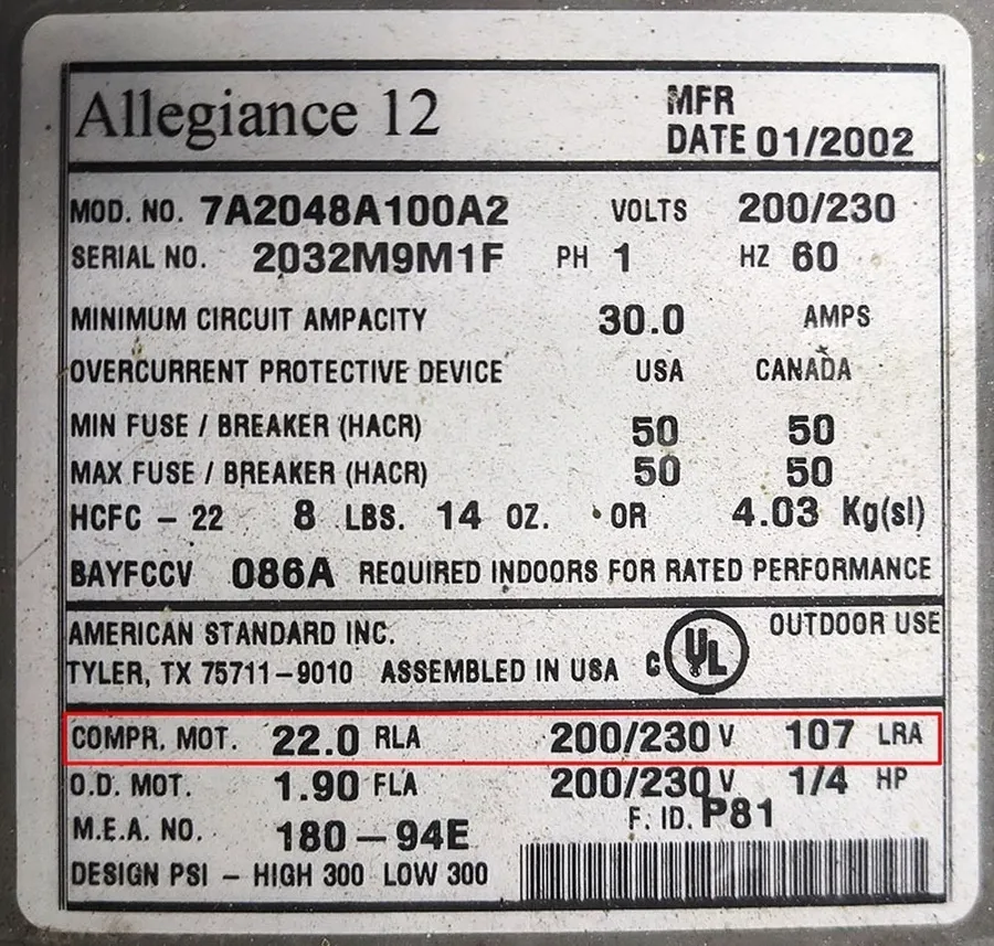 A close-up of an AC capacitor label showing its specifications.