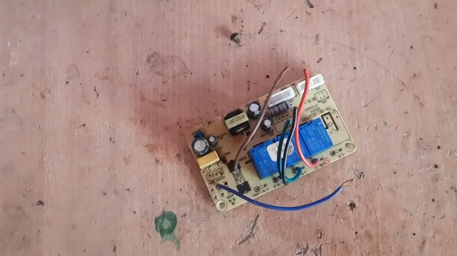 A damaged Faber chimney PCB board with visible issues.