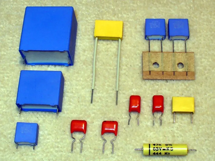 A collection of different types of capacitors, including ceramic, electrolytic and tantalum.