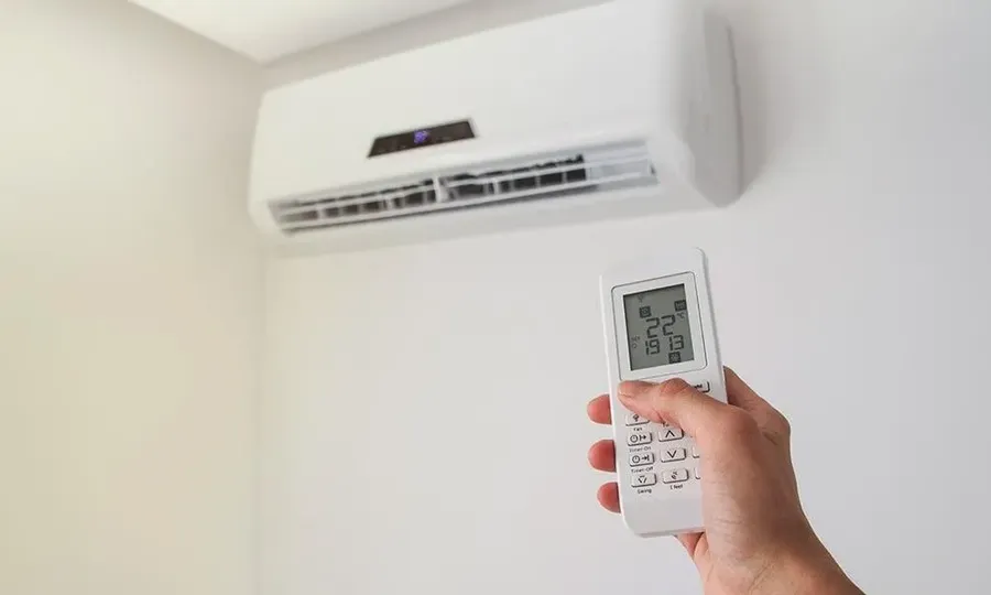 A split type air conditioner, showcasing the indoor and outdoor units.