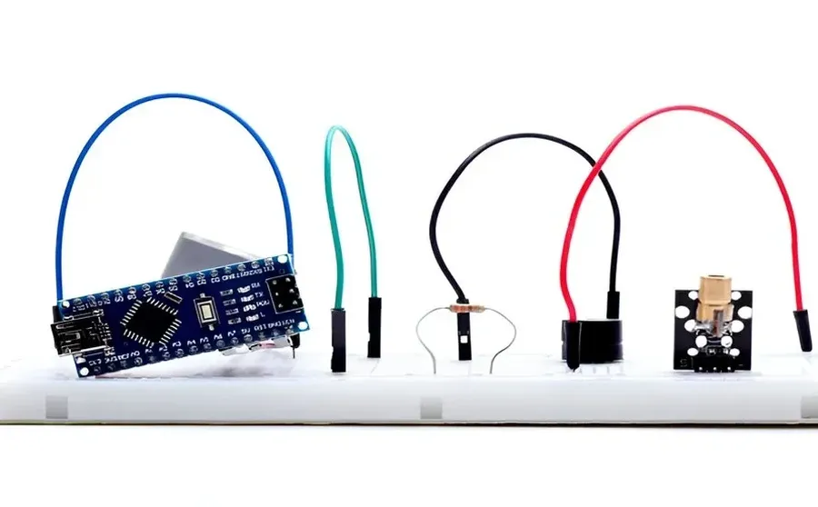 A circuit built on a zero PCB board with electronic components.