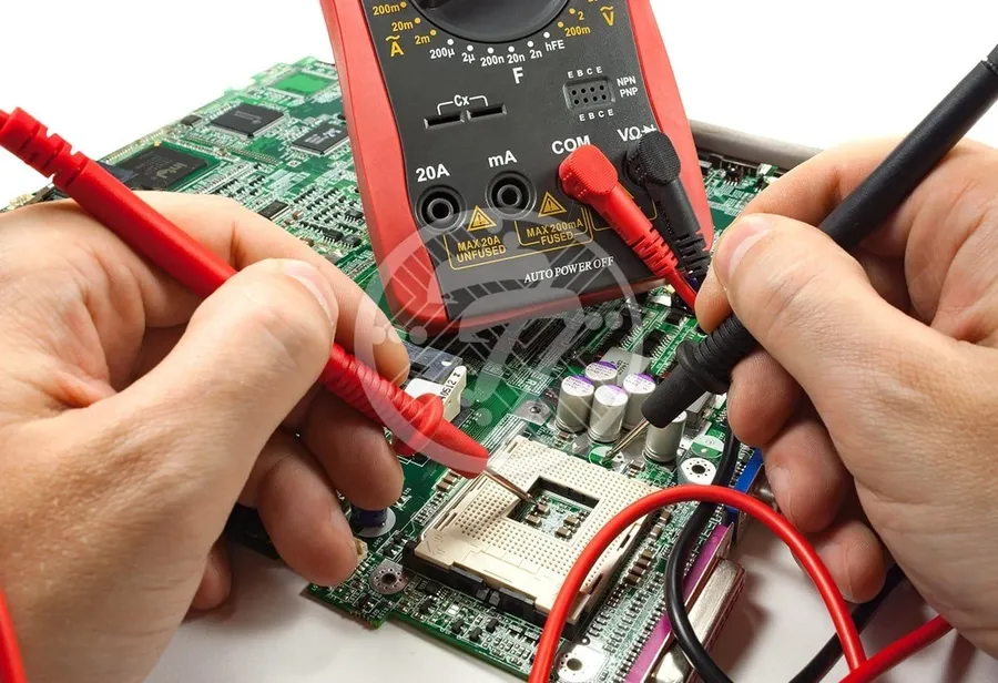 A person using a multimeter to troubleshoot a circuit.