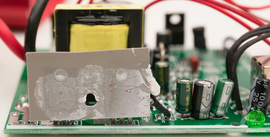 A technician repairing a Luminous inverter PCB board.