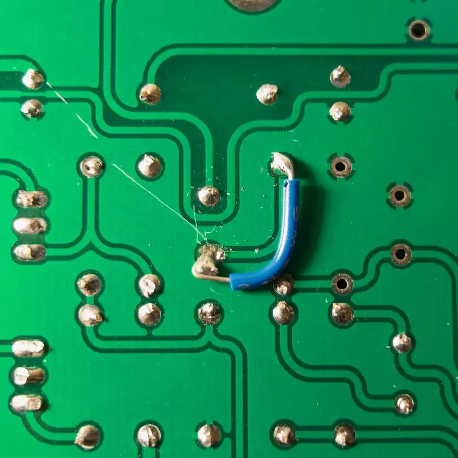 A damaged FR4 PCB showing signs of wear and tear.